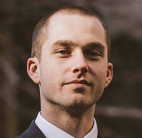 Crypto market specialist Thomas Whitfield, a trading analyst, in portrait form